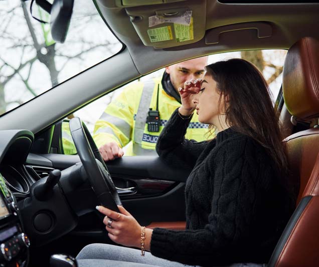 Girl stopped by police officer for breathalyser sample